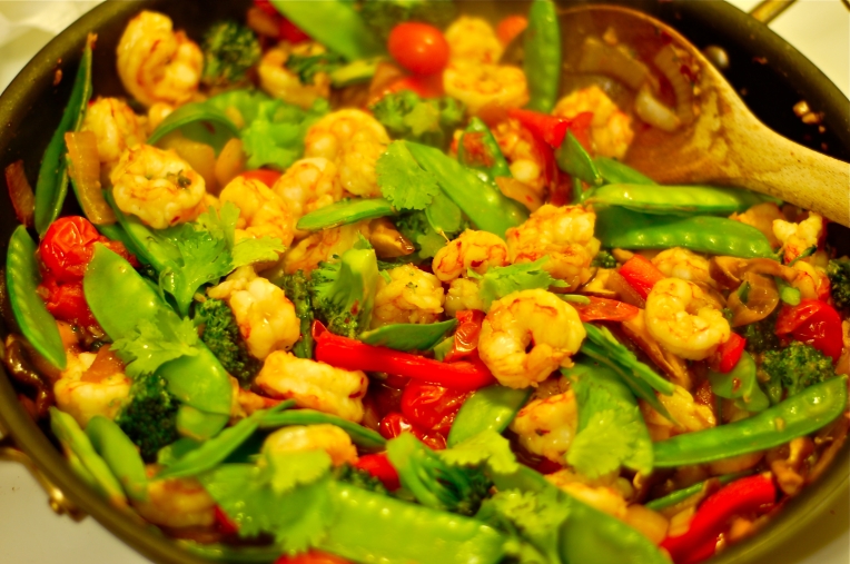 shrimp and vegetable stir fry image on a pan